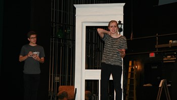In the production of Almost, Maine on the Anoka-Ramsey Community College Coon Rapids Campus stage, Nov. 2, 3, 8, 9 & 10, student actor Tricia Buerke (right) rehearses her role as Hope, a woman who has traveled the world with fellow actor and student Logan Douglas, who plays a man who hasn’t.