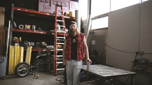 Student Spencer Cleland pictured in glassblowing workshop.